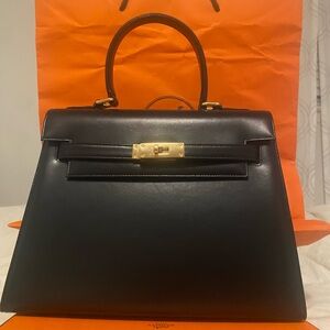 Hermes Black Leather Satchel with Gold Accents